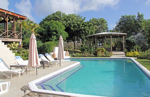 Saint David's Villa | Half Moon Villa :- A beautiful villa with a large pool & garden, ocean views.