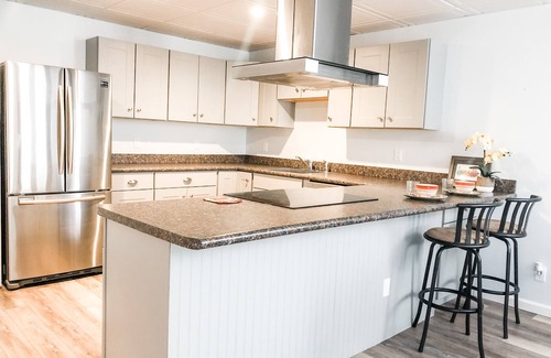 Hampton Bays House | Hampton Bays luxury retreat with heated pool, steps from the Beach! Pet friendly