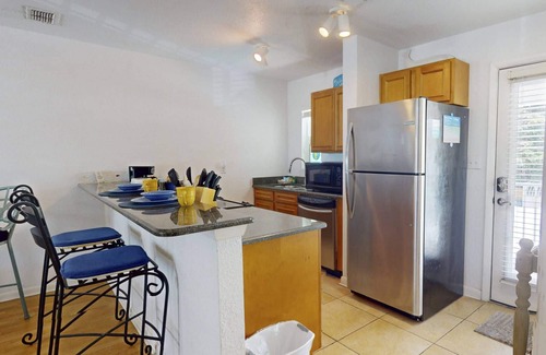 Pass-a-Grille Historic District Condo | Heart of Pass-A-Grille Beach! Beach Across the Street ~ Community Heated Pool ~ Beach-facing Balcony
