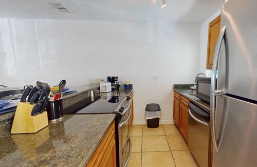 Pass-a-Grille Historic District Condo | Heart of Pass-A-Grille Beach! Beach Across the Street ~ Community Heated Pool ~ Beach-facing Balcony