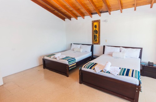 Guatape Hotel | Hermosa Habitación Deluxe Familiar En Guatape