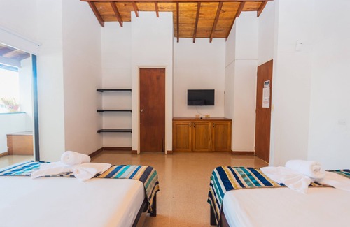 Guatape Hotel | Hermosa Habitación Deluxe Familiar En Guatape