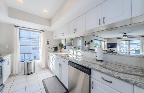 Clearwater Beach Condo | Hidden Beach Retreat | Pool | Steps from the sand