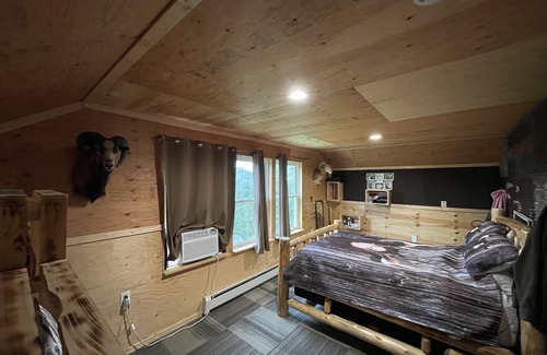 Turin Bed & Breakfast | Hill Top Cabin W/drive out snowmobiling and ATV riding.