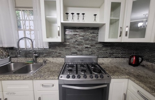 Nassau House | HILLSIDE GATED PRIVATE HOME WITH FULL SIZED SWIMMING POOL