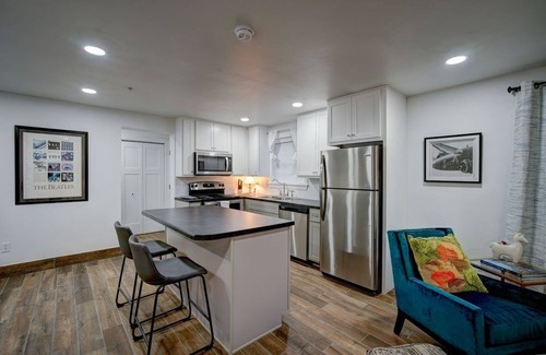 Woodward Apartment | Historic 100+ year old restored 6 unit fully furnished apartment building.