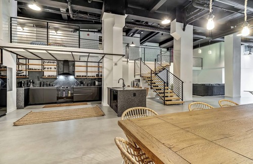 Center City East Apartment | Historic District Loft! Garage Parking! Sleeps 13n