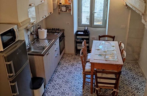 Martano House | Historic house with a fantastic balcony for unique evenings.