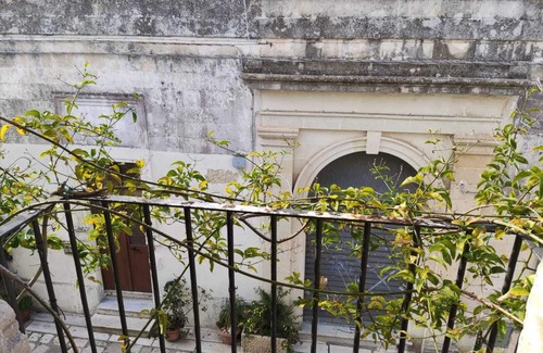 Martano House | Historic house with a fantastic balcony for unique evenings.