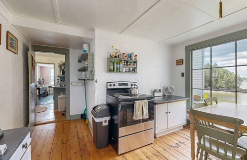 Trevett Cottage | Historic riverfront home with boathouse & private dock - dogs OK