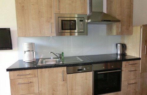 Alpendorf Apartment | Holiday Apartment "Landhaus Gruber" with Mountain View, Balcony & Wi-Fi