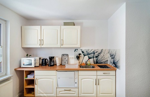 Leinefelde-Worbis Apartment | Holiday Apartment Veronika in "Alte Gärtnerei" with Shared Garden and Wi-Fi