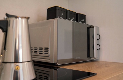 Carlazzo Apartment | Holiday Apartment "1" with Lake View, Shared Pool & Shared Garden