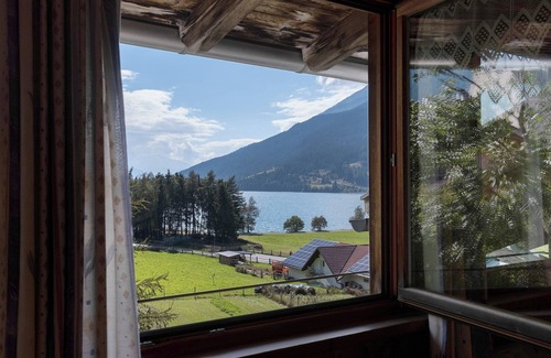 Resia Apartment | Holiday Apartment 'Appartements Egart 2' with Lake View, Balcony and Wi-Fi