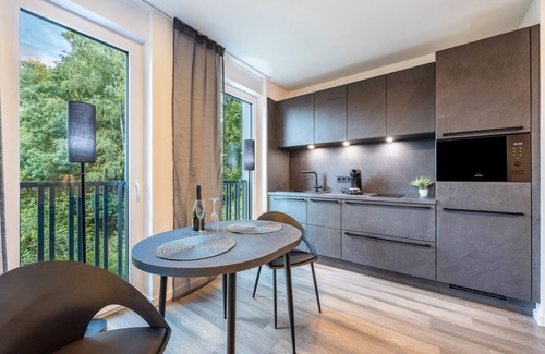 Altenbeken Apartment | Holiday Apartment "Egge Resort 7g" with Balcony, Whirlpool and Sauna