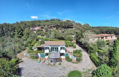 Capoliveri Apartment | Holiday Apartment "Il Giardino Nel Sole Bilo" with Air Conditioning, Garden and Terrace