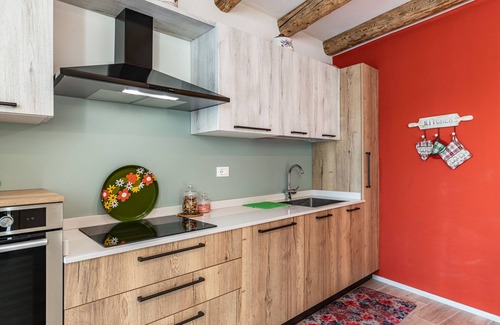 Levico Terme Apartment | Holiday Apartment 'L'Antica Corte Apt Angelina' with Mountain View, Balcony & Wi-Fi