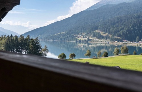 Resia Apartment | Holiday Apartment 'Mansardenwohnung Egart' with Lake View, Balcony and Wi-Fi