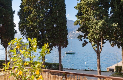 Cassone Apartment | Holiday Apartment "Randa" On Lakeside with Balcony, Terrace and Stunning View