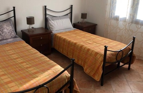 Palmadula House | Holiday Apartment "Tra Alghero e Stintino" with Air Conditioning, Terrace & Sea View