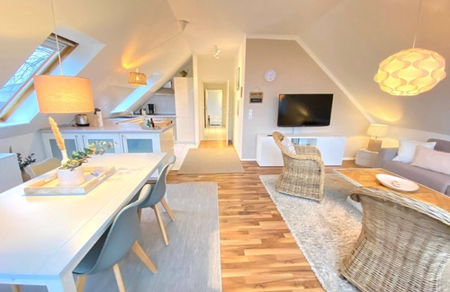 Wellsee House | Holiday apartment with a parking space, surrounded by greenery