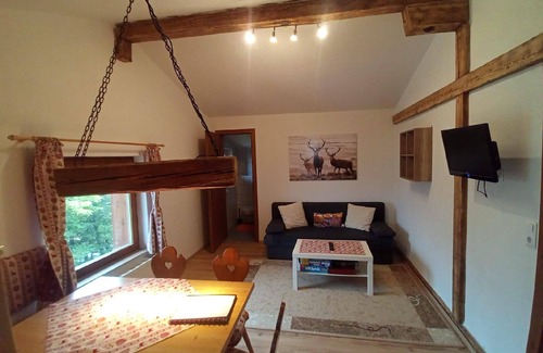 Haggen Apartment | Holiday apartment in a beautiful natural setting, with its own balcony and use of a barbecue and a playground