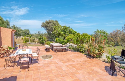 Santa Teresa di Gallura Villa | Holiday Home in Idyllic Location with Wi-Fi, Garden and Sea View; Parking available; Pets allowed