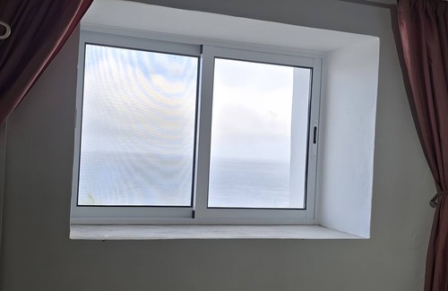 Lajes das Flores House | Holiday Home 'Baía Do Porto Das Lajes' with Sea View, Private Terrace and Wi-Fi