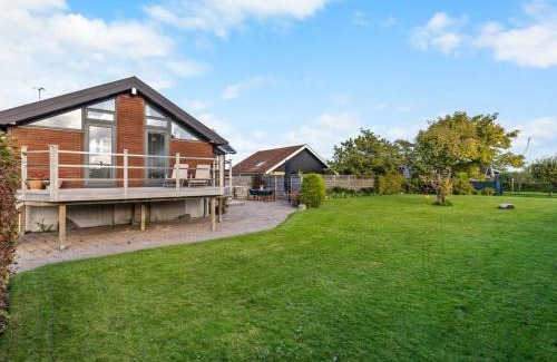 Tørresø House | Holiday Home Berner - 40m from the sea by Interhome