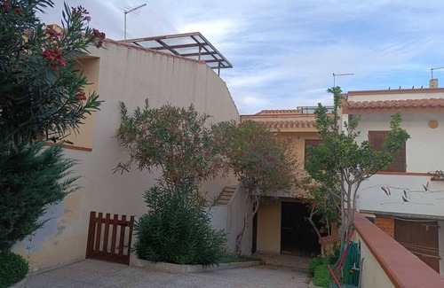 Funtana Meiga House | Holiday Home 'Casa Funtana Meiga' close to the Beach with Sea View, Shared Garden & Terrace