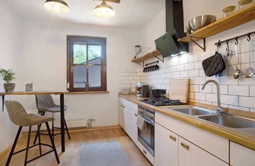 Friedrichshafen House | Holiday Home 'Die Bahnstation' with Private Terrace, Private Garden and Wi-Fi
