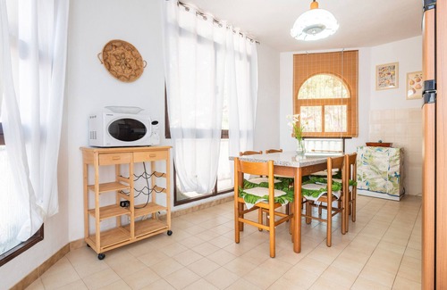 Solanas House | Holiday Home 'Giovanna - Relax Beach 80m' with Sea View, Wi-Fi and Air Conditioning