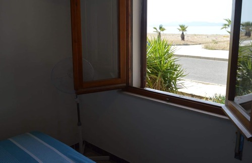 Torre Grande House | Holiday home on the Torregrande seafront, 30 meters from the seashore