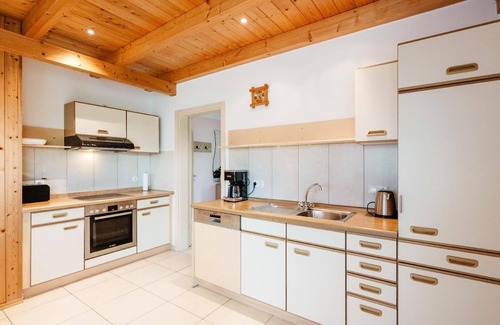 Kneisting House | Holiday home to the vine arbour with terrace.