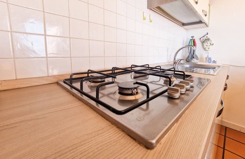 Portoferraio House | Holiday Home 'Trilocale Maestrale Beach' with Sea View, Terrace and Air Conditioning