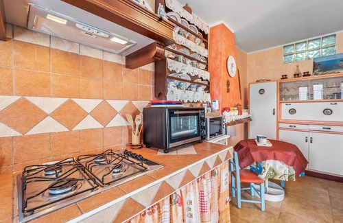 Solanas House | Holiday Home 'Villetta Degli Oleandri' with Sea View, Private Terrace and Air Conditioning
