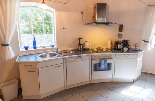 Cuxhaven House | Holiday Home 'Windmill Betty by the North Sea' with Private Terrace, Private Garden and Wi-Fi