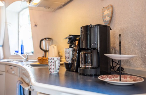 Cuxhaven House | Holiday Home 'Windmill Betty by the North Sea' with Private Terrace, Private Garden and Wi-Fi