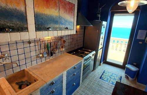 Porto Tricase House | Holiday house in a unique location by the sea, with a view of a bay, with terraces and parking space