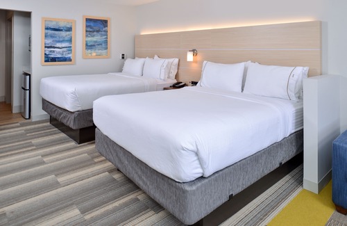 Brighton Hotel | Holiday Inn Express & Suites Brighton South - US 23, an Ihg Hotel