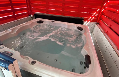 Pointe-Noire Apartment | Homerez - Apt Pointe-Noire - Pool and Jacuzzi