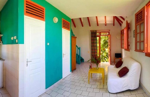Sainte-Rose House | Homerez - House for 4 ppl. with shared pool, sea view and garden at Sainte-Rose