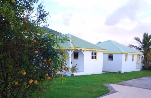 Damencourt House | Homerez - House for 5 ppl. with shared pool, garden and terrace at Le Moule