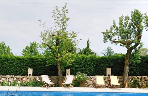 Fatauncos House | Homerez - House for 8 ppl. with shared pool, garden and terrace at Vouzela