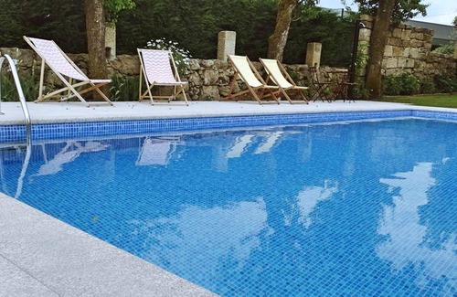 Fatauncos House | Homerez - House for 8 ppl. with shared pool, garden and terrace at Vouzela