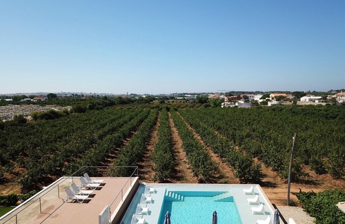 Faro Apartment | Homerez last minute deal - Amazing studio with shared pool
