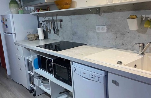 Lapte Apartment | Homerez - Renovated Apartment in Lapte with Terrace 40 m²