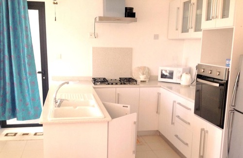 Wolmar Apartment | Homerez - Spacious appartement for 7 ppl. with shared pool at Flic en Flac