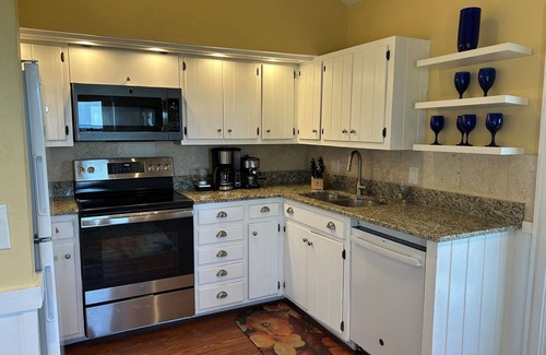 Placida Cottage | Honeymoon or Anniversary getaway beachfront with bay dock!