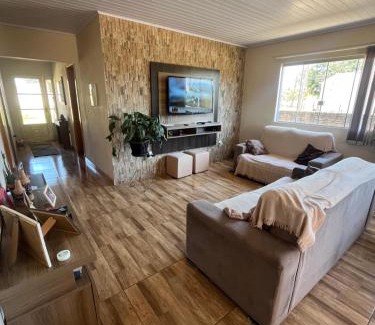 Bonfim House | Hospedagem familiar com piscina e churrasqueira